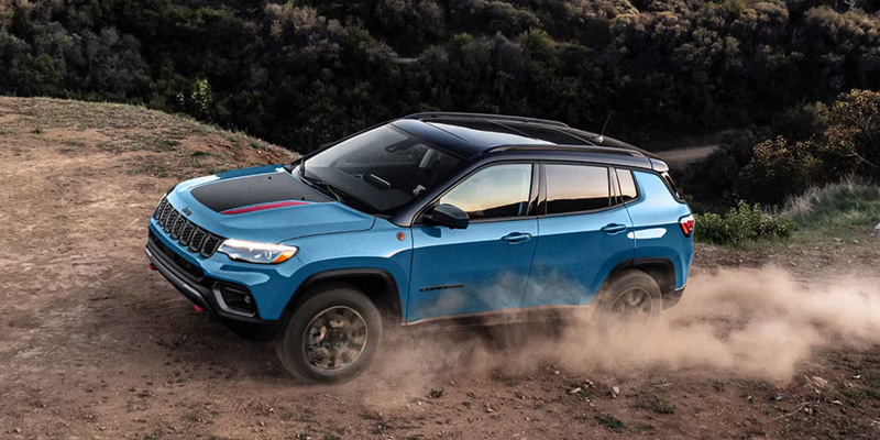 2026 Jeep Compass compact SUV in Baytown TX with 2.0L turbo engine, modern interior.